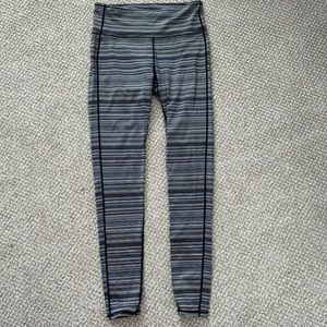 Athleta Chaturanga Leggings full length stripe black white medium EUC